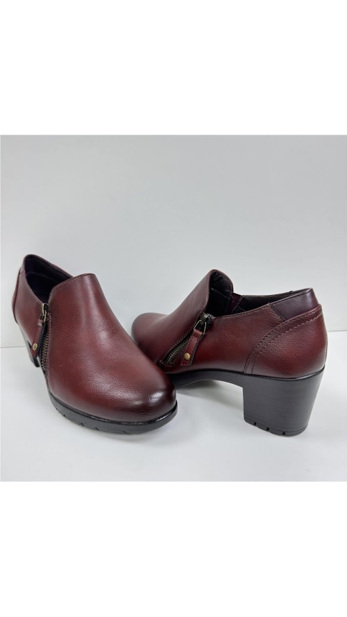 ZAPATO ABOTINADO CON PISO GOMA BURDEOS